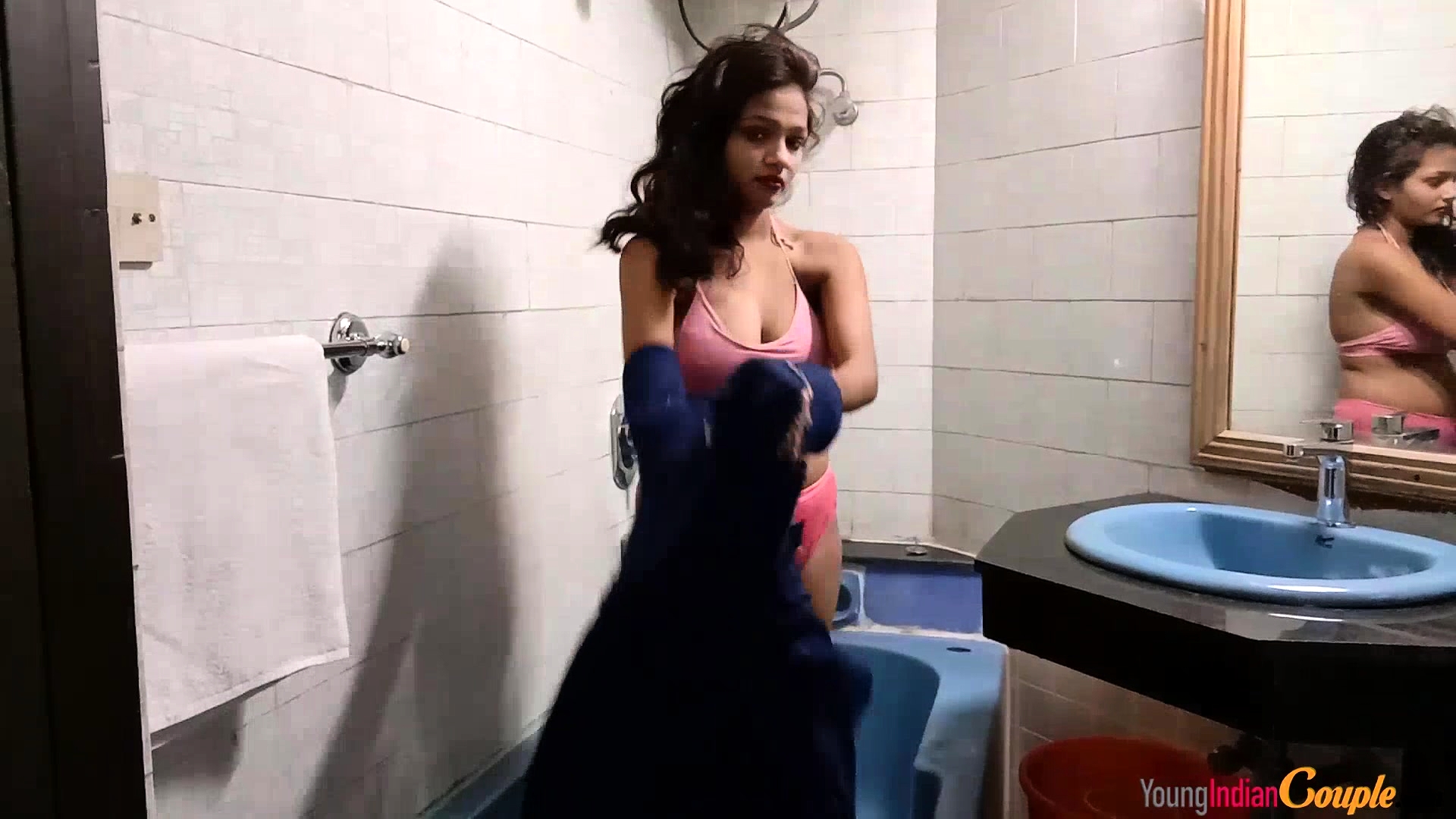 Foxy girl playing shower