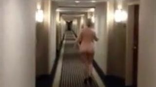 Boomer reccomend wife walking through hotel hallways