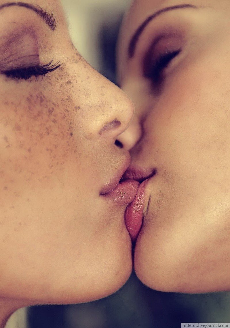 Girls kissing girls up close